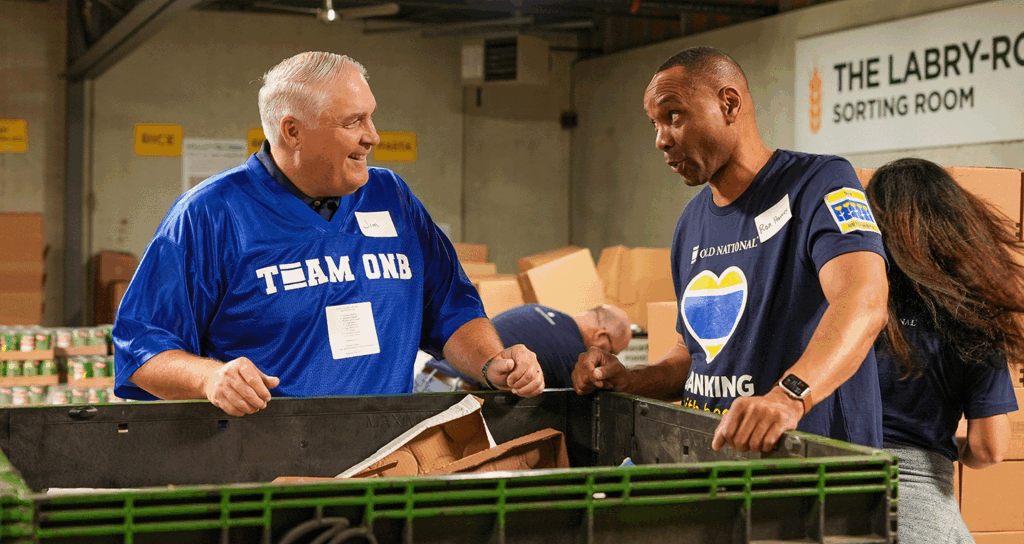 a photo of Jim Ryan and a colleague during an Old National Bank volunteer event