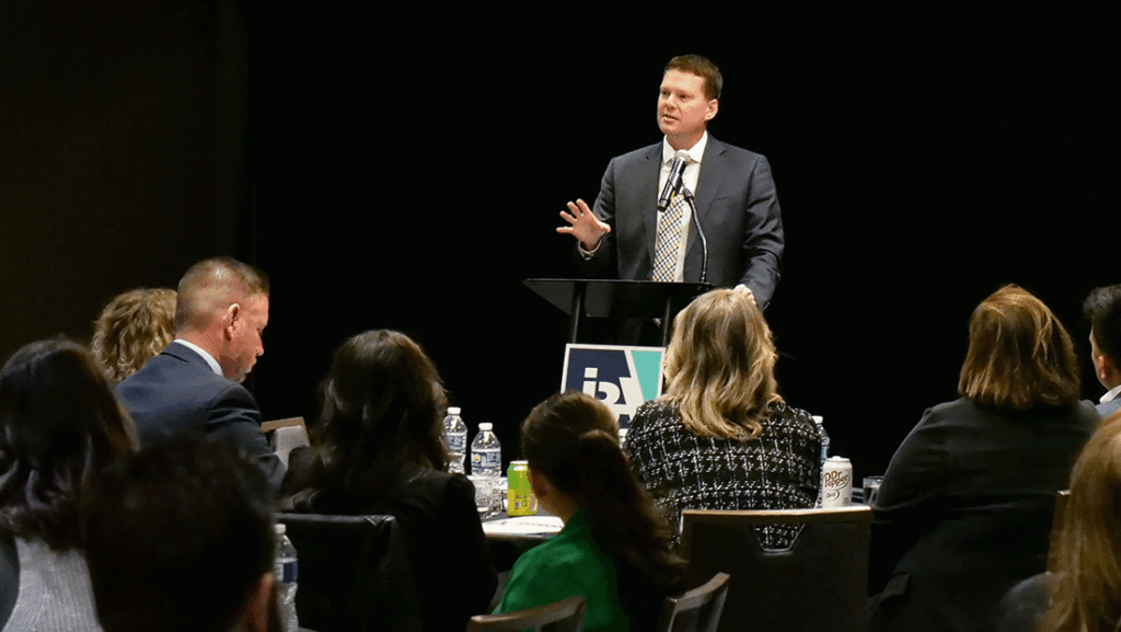 a photo of Lucas White addressing the IBA Future Leadership Division
