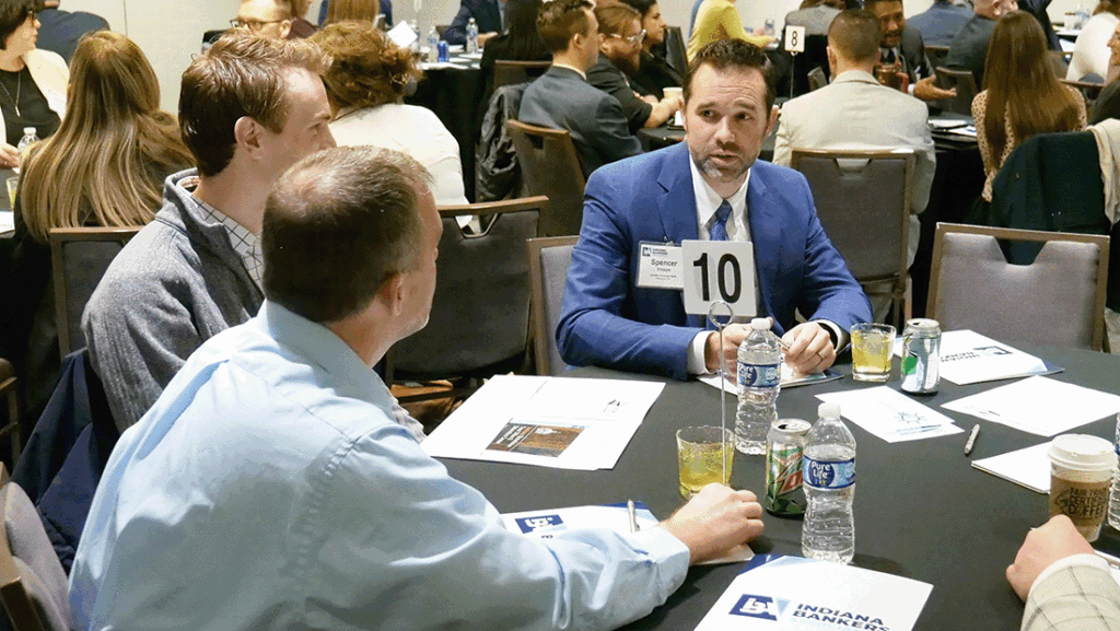 a photo of members of the Future Leadership Division engaging in a roundtable discussion