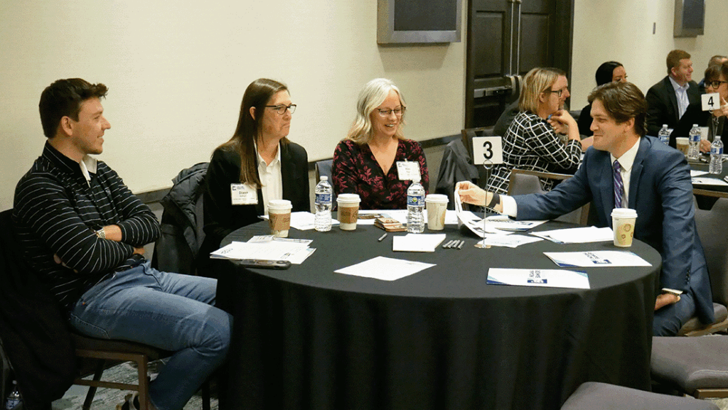 a photo of members of the Future Leadership Division engaging in a roundtable discussion
