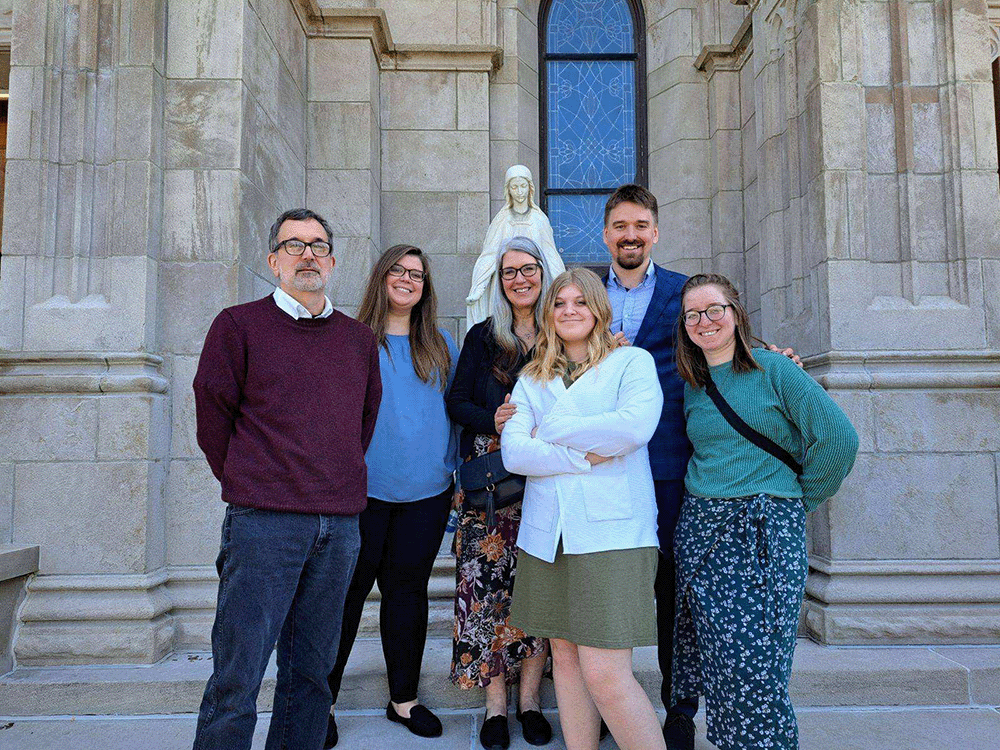 a photo of Brit Hollopeter with her family