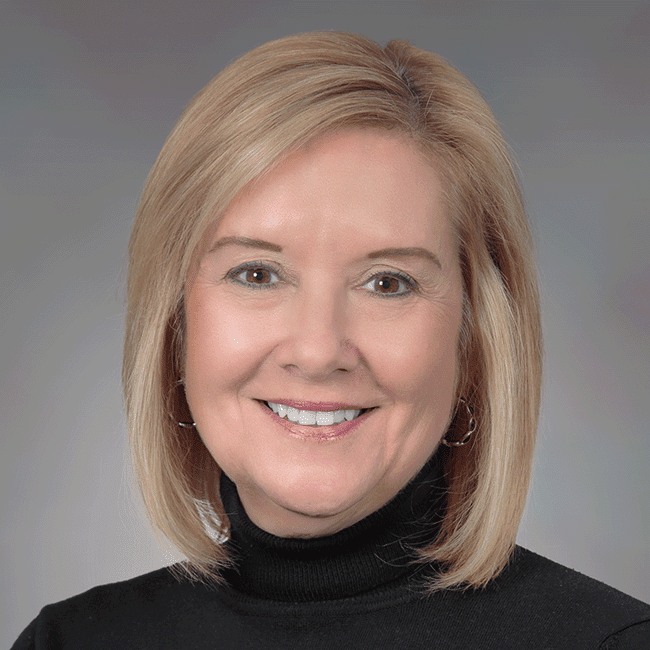 a headshot of Michele Magnuson