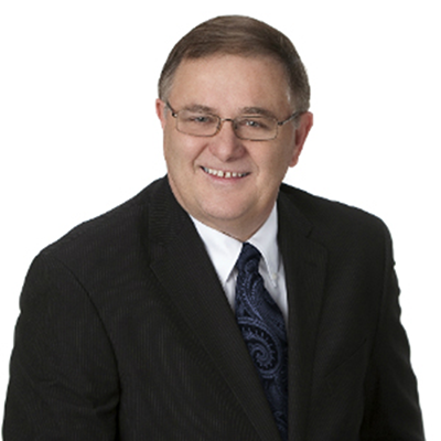 headshot of Ken Schnaus