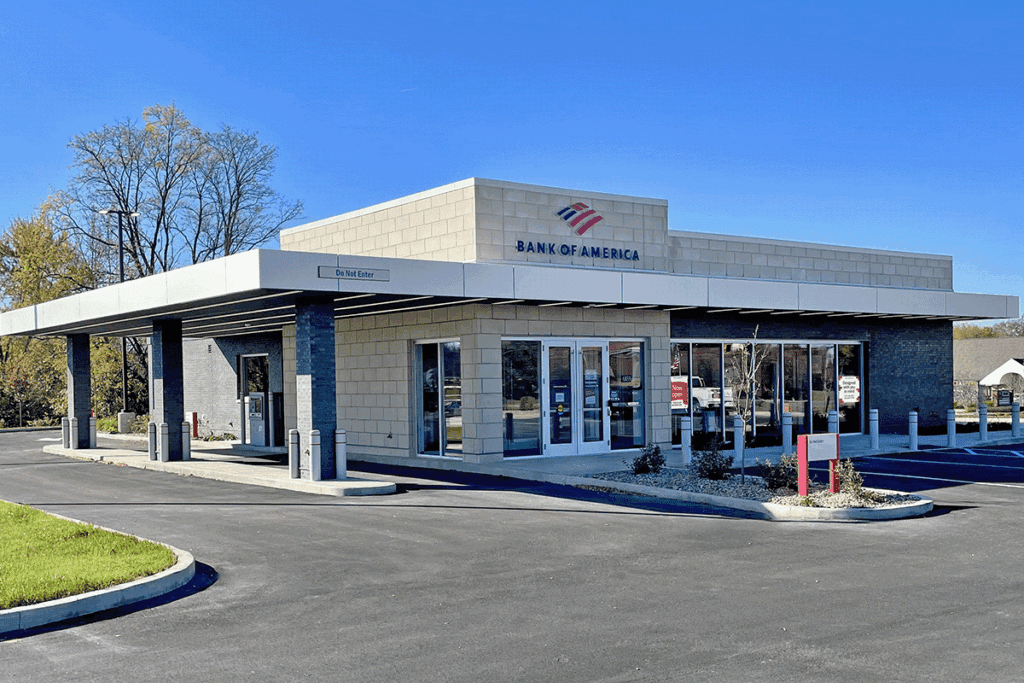 a photo showing a light-toned building with a drive-thru