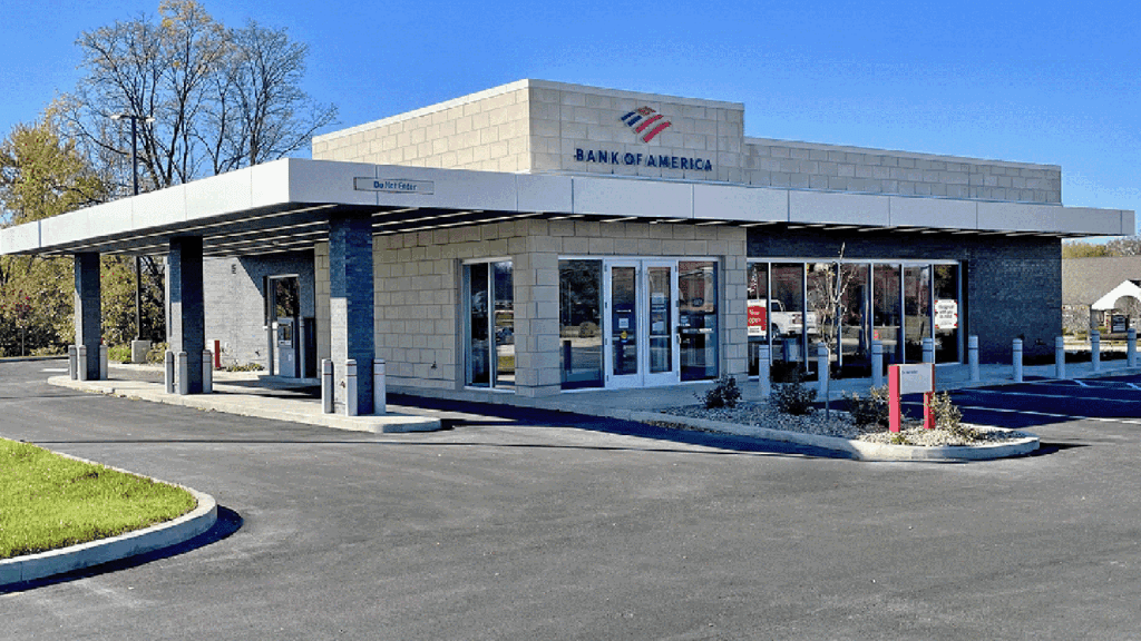 a photo showing a light-toned building with a drive-thru