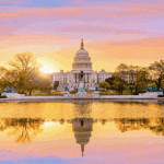 a photo showing the sun rise behind the U.S. Capitol building