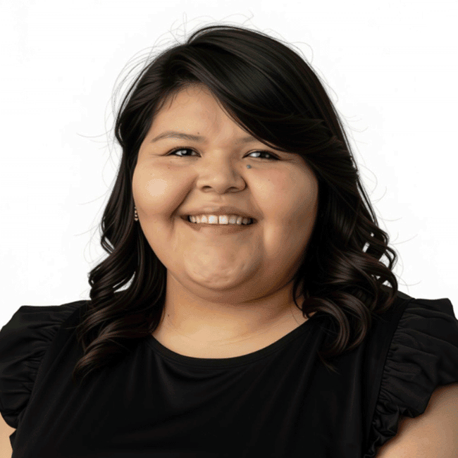 Portrait of a smiling woman with dark hair, wearing a black top, against a white background.